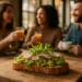 Boston Brunch Openings plates on a cafe table with coffee and fruit