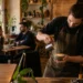 Coffee Shop Ambiance with warm tables and a quiet espresso bar