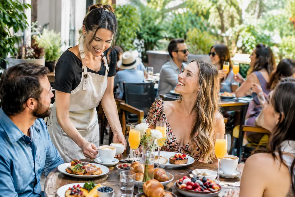 Table of egg dishes and fruit at new brunch spots using fresh local ingredients