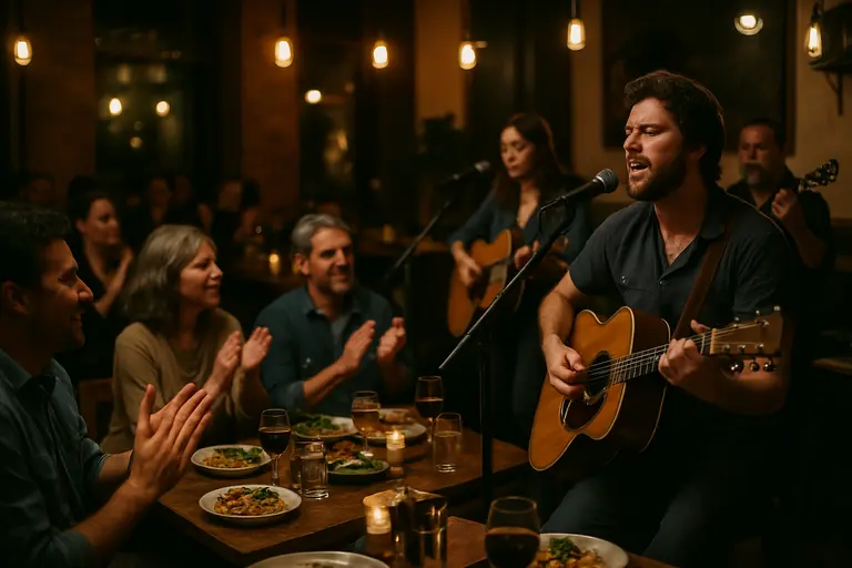 Small restaurant stage set for live music near dining tables